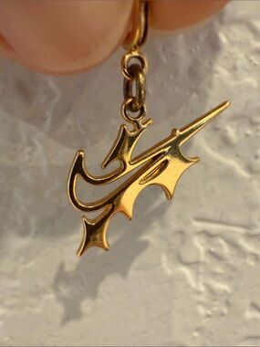 Nike Spike Pendant Charm